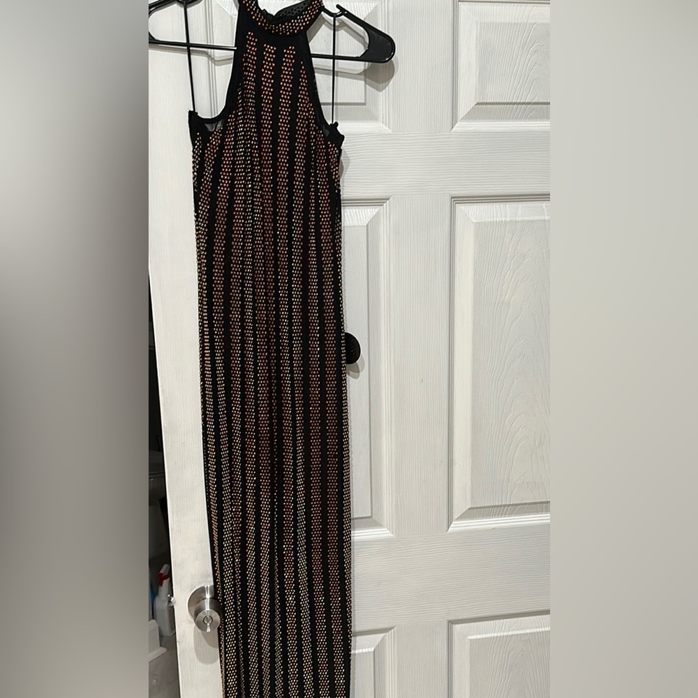 Hot Miami Styles black dress with gold medal beads.